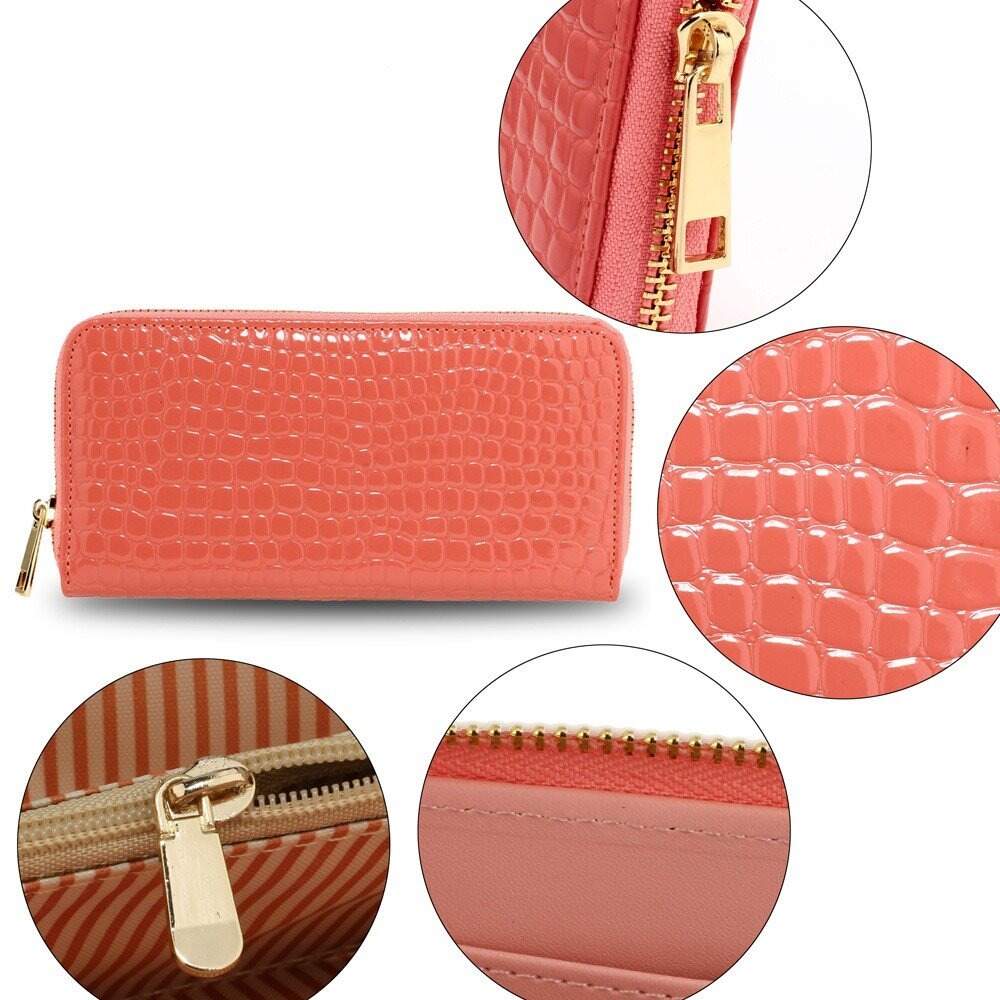 pink zip around crocodile pattern