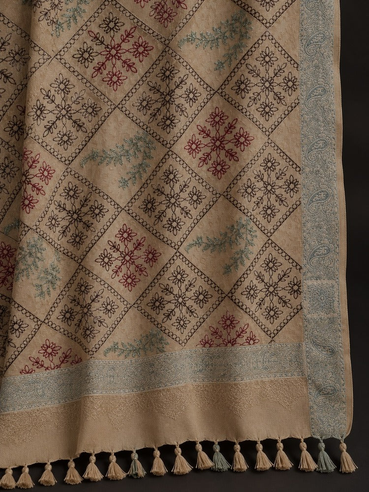 Beige shawl for women with multicoloured floral embroidery, diamond patterns, sage-grey borders and decorative tassels.