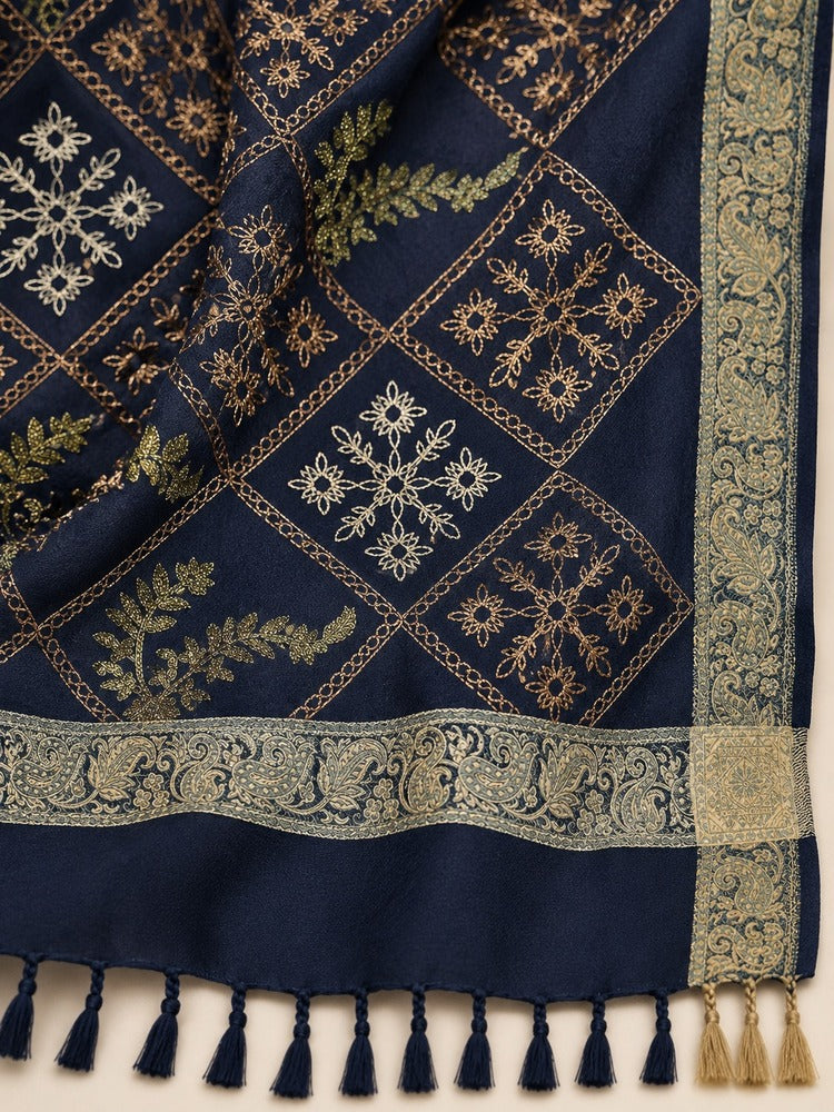 Navy shawl for women with gold-toned diamond embroidery, floral and leafy motifs, ornate borders and matching tassels.