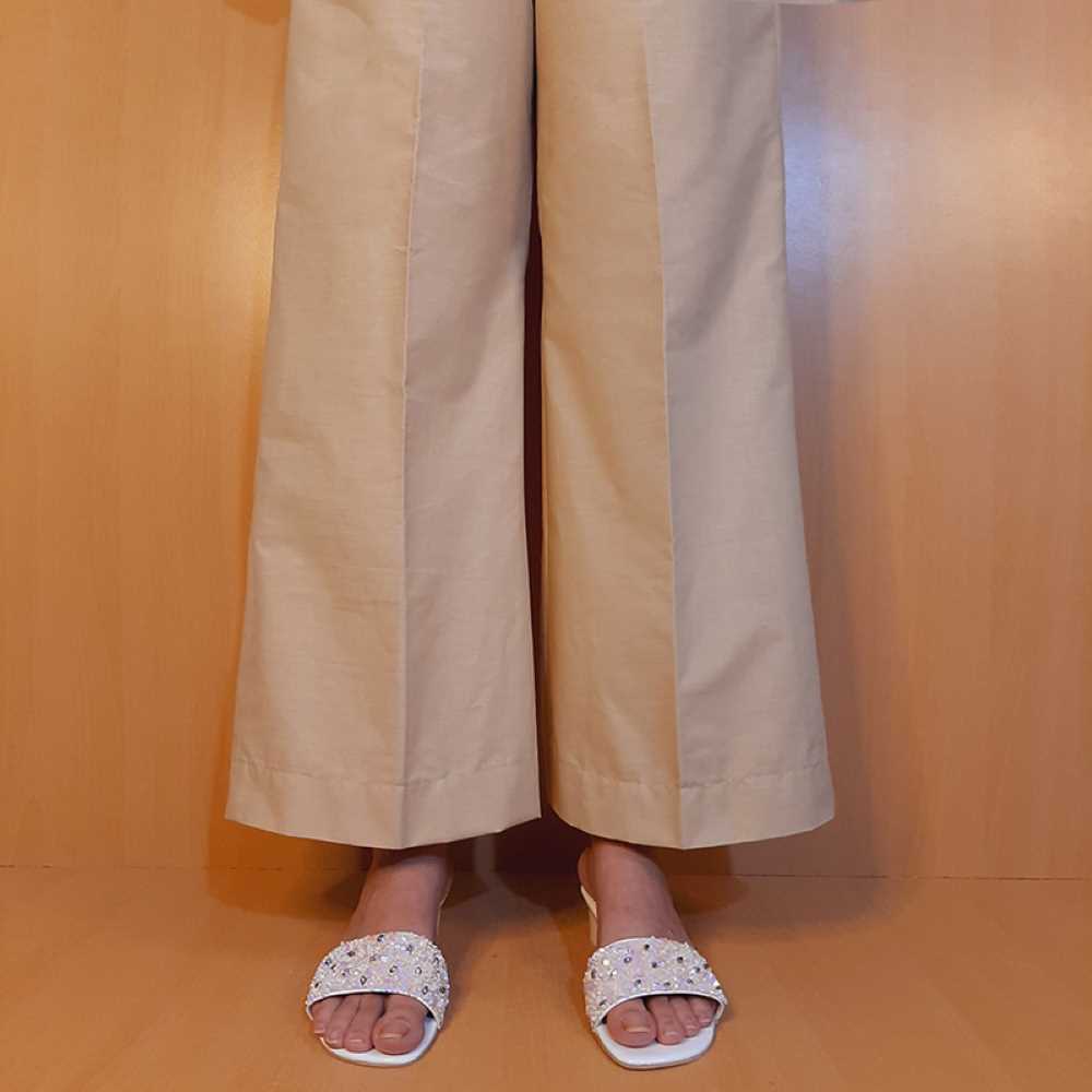 Beige bell bottom flared pants