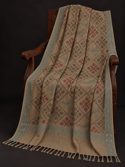 Beige shawl for women with multicoloured floral embroidery, diamond patterns, sage-grey borders and decorative tassels.