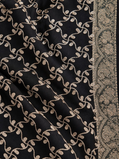 Black winter shawl with intricate gold-toned embroidery, ornate patterned borders and decorative tassels