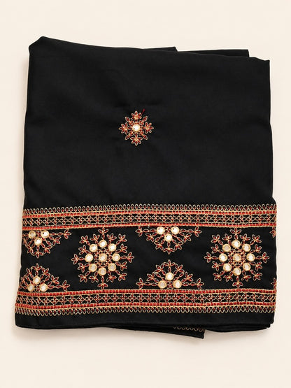 Embroidered Black Shawl on Beige Backdrop