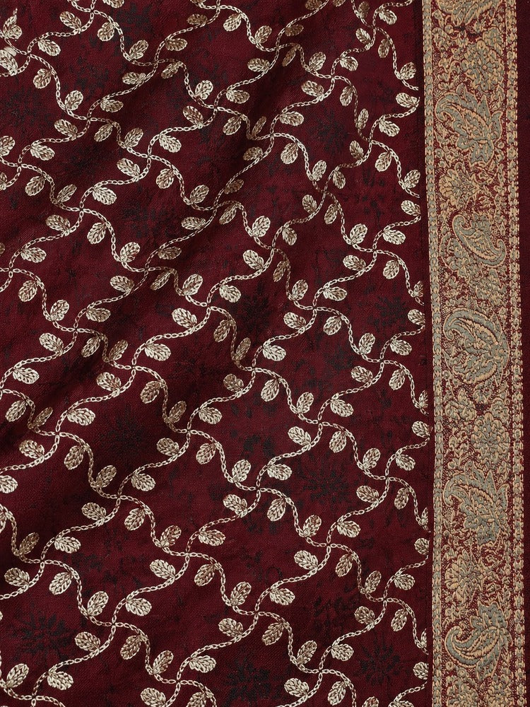 Maroon embroidered winter shawl with golden threadwork, ornate patterned borders and matching decorative tassels.