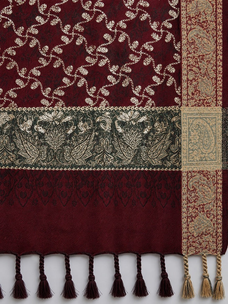 Maroon embroidered winter shawl with golden threadwork, ornate patterned borders and matching decorative tassels.