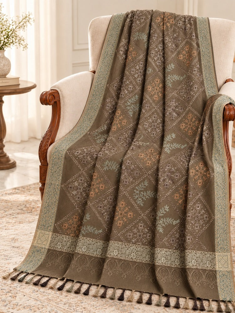 Taupe-brown embroidered shawl with multicoloured floral diamond motifs, teal-toned borders and decorative tassels.