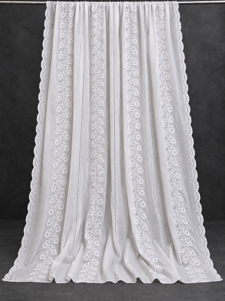 White chikankari chadar for women featuring delicate floral embroidery and scalloped edges